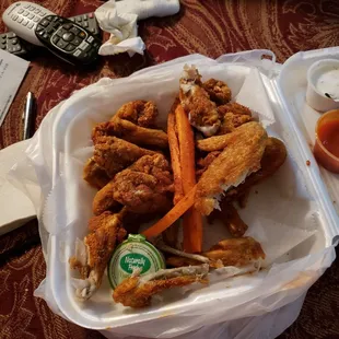 a meal in a styrofoam container