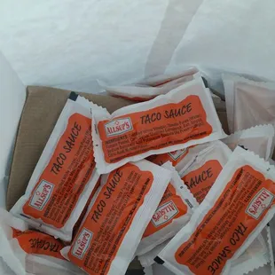 a box of hot sauce packets