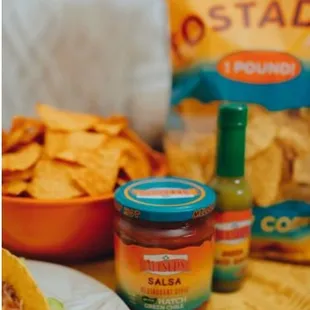 tortilla, salsa, and chips on a table