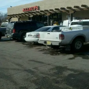 a white truck parked in a parking lot