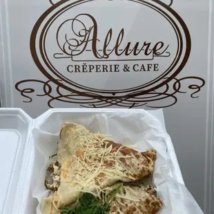 Delicious chicken, Swiss cheese, spinach, and mushrooms crepe.