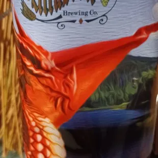 a can of beer on a table