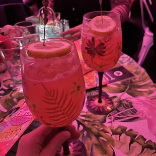 a person holding a wine glass