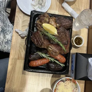 Parrillada for 2, side of fries, and house salad.