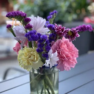 a vase of flowers on a table