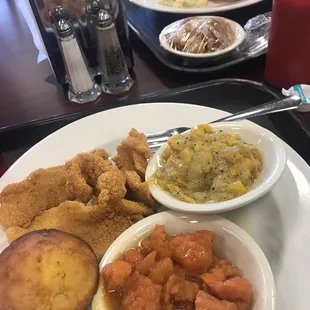 Near plate:Fish, sweet potatoes, squash &amp; spicy cornbread.Far plate:Fish, mac &amp; cheese,  mashed potatoes &amp; gravy &amp; a side of apple pie.