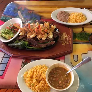 So we ordered the parrilla for 2 with beef fajitas and shrimp.I got charro beans and my hubby the retried beans,not enough pico de Gallo