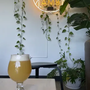 a glass of beer on a table