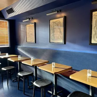 a row of tables in a restaurant