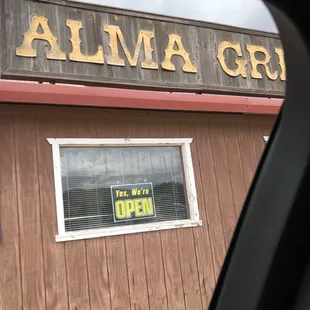 a sign in the window of a car