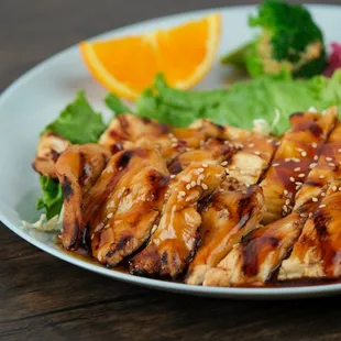 Indulge in the savory sweetness of our Teriyaki Chicken! Tender, juicy, and bursting with flavor!