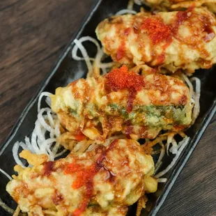 Indulge in the spicy goodness of our Jalapeno Poppers!  Crispy, cheesy, and oh-so-satisfying!