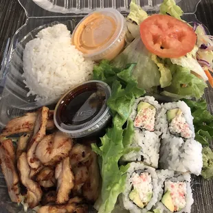 Two item bento box with chicken teriyaki and California rolls