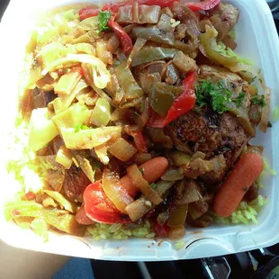 Chicken thighs and vegetables, with two meat pies and rice for $10! Huge portion...can feed three!