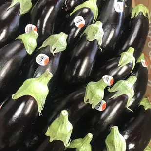 a large pile of eggplant