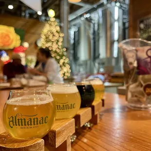 beer flight (Texas Blue Corn Whiskey, BIG LOVE Hazy DIPA, Your Hazy Soul and TRUE Kölsch)