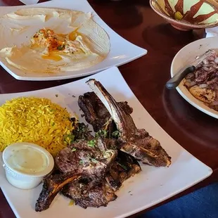 Musakhan, lamb chops, greek salad, hummus