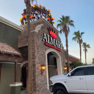 a truck parked in front of the restaurant