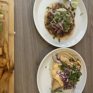 Fish taco and flank steak taco