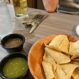 Complimentary chips and 2 kinds of salsa