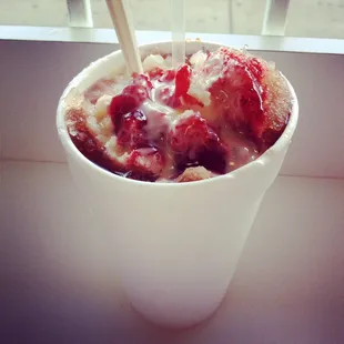Obispo! Shaved ice, condensed milk, strawberry marmalade and a scoop of ice cream on the bottom! Yum!