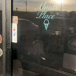 the reflection of the sun in the window