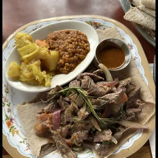 Tibs with Injera and lentil stew