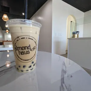 a smoothie in a plastic cup