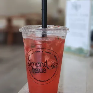 a drink in a plastic cup