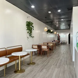 Inside seating, has booths and more tables inside