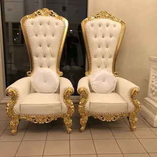We now offer throne chairs, gold Chiavari chairs, and love seats to go with the perfect package!