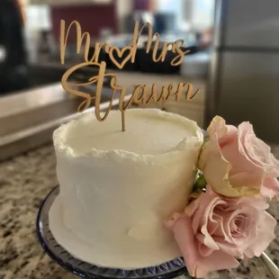 cutting cake, almond w/raspberry filling