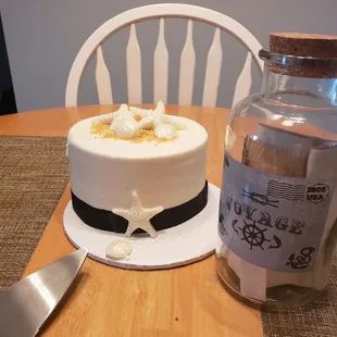 Our 1 year cake! This cake had to make a 4 hour journey via my mother's car, so it slid a little bit but it was STILL amazing!