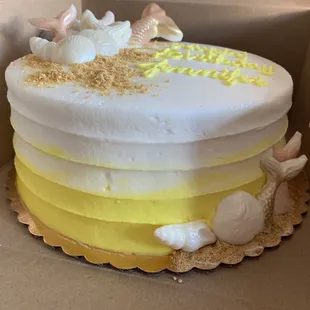 Mermaid theme yellow ombré coconut cake