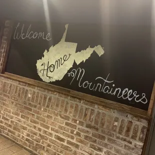 a chalkboard with a map of the state of new york
