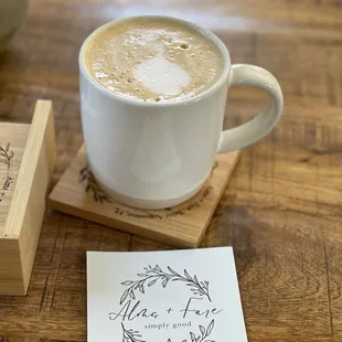 Almond milk latte with A + F&apos;s honey cinnamon syrup.
