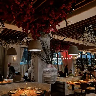 a dining area with tables and chairs