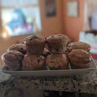 a plate of muffins on a counter