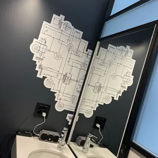 Cool wallpaper details, the whole room has a modern whimsical look!