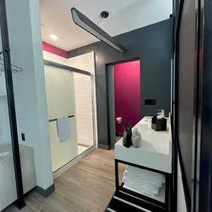 Dry Bar brand bath essentials, plenty of soft towels, a safe, hangers and blow dryer.