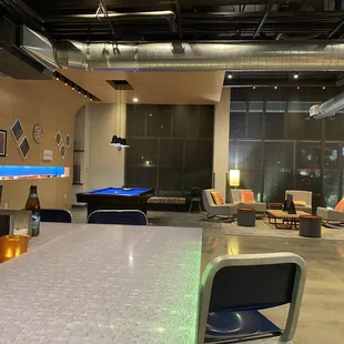 Bar view toward pool table and table games