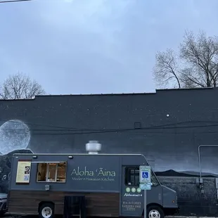 a food truck parked in front of a building