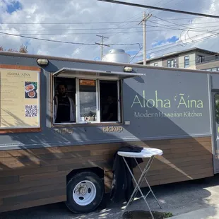 a food truck parked on the side of the road