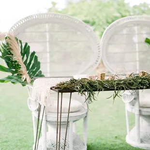 Our White Peacock Chairs and Mr &amp; Mrs hairpin Sweetheart table available for rent.
