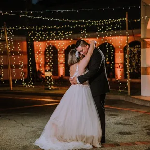 The string lights were more beautiful as it got darker and we had our first dance.