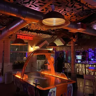 Air hockey table and bar area