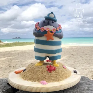 a cake on a beach