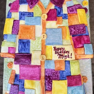 Recreation of Dolly Partons Coat of Many Colors in cake!! Looks just like the real thing, down to the buttons.
