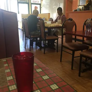 Wrapping egg rolls at an open table without gloves!