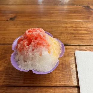 Tigers blood, mango, lilikoi small size shaved ice in a bowl